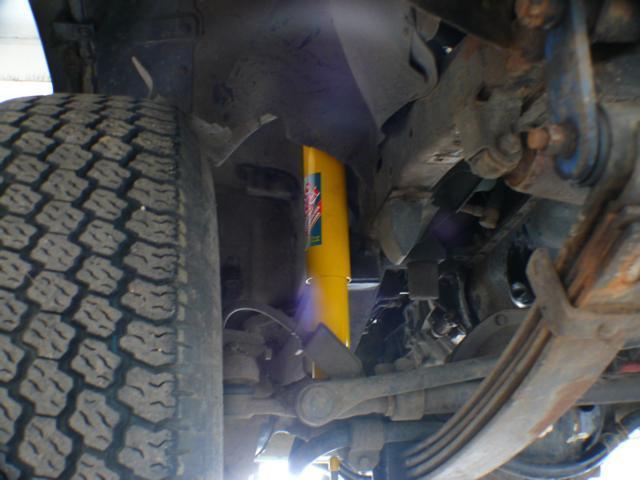 ome.JPG - well...we had to find out that our old shocks wouldnt make it...so we bought some new Old Man Emu heavy duty shocks...